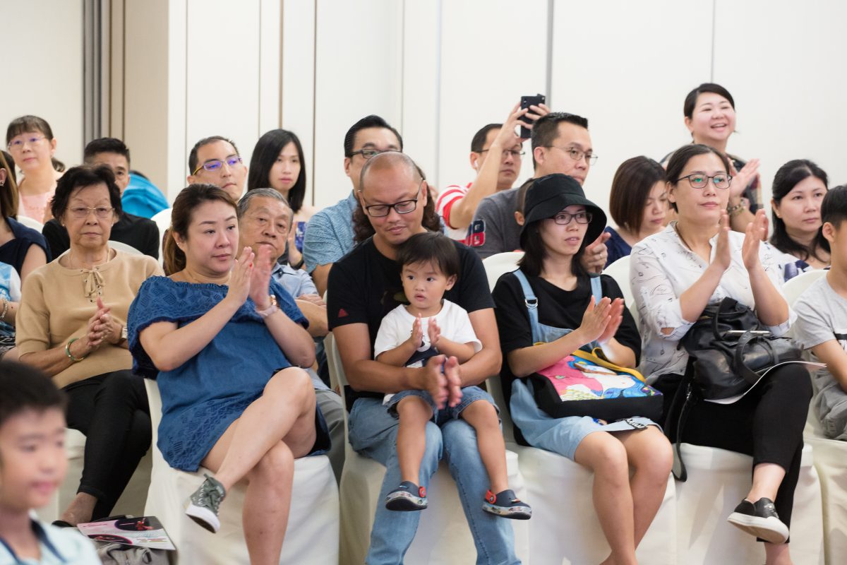Fine momentum parents supporting performing kids