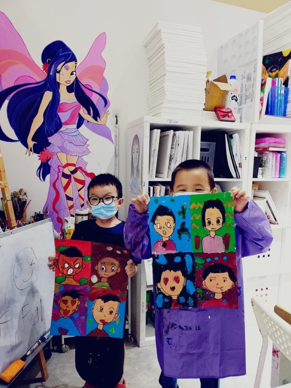 Fine momentum art class students showcasing their artwork