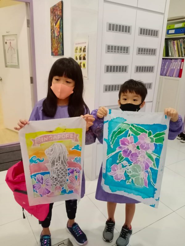 Fine momentum art class students showcasing their artworks