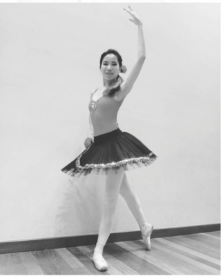 Fine momentum adult ballet student showcasing ballet poses