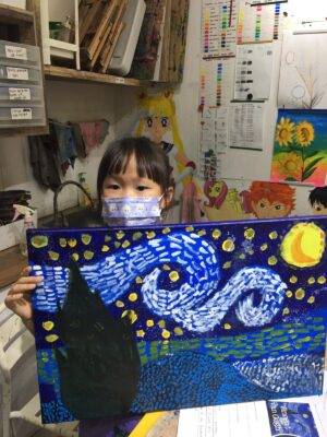 Our art student at Fine momentum showcasing her artwork after art lessons