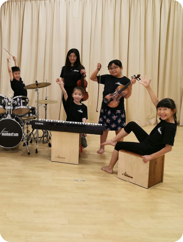 Fine momentum music classes students and instructor