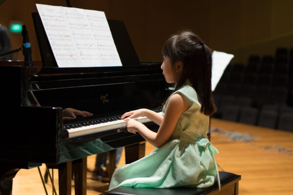 Fine momentum kids piano lesson student