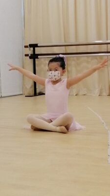 Fine momentum ballet classes for kids student performing ballet