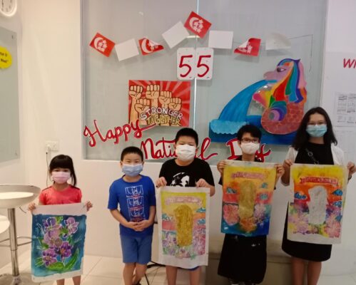 Fine Momentum students showcasing their art for national day after art lessons